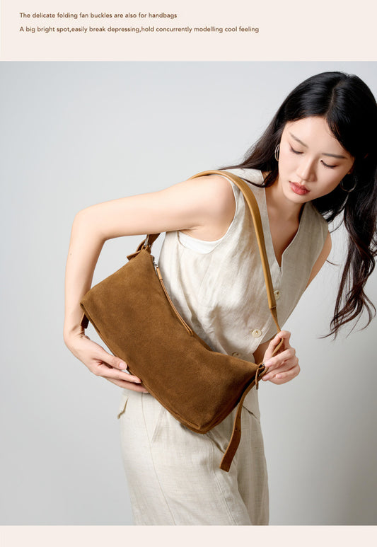 Close lifestyle view of the bag worn on the shoulder