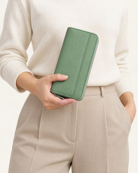 Leather Long Zip Clutch RFID Wallet held in hand by a model