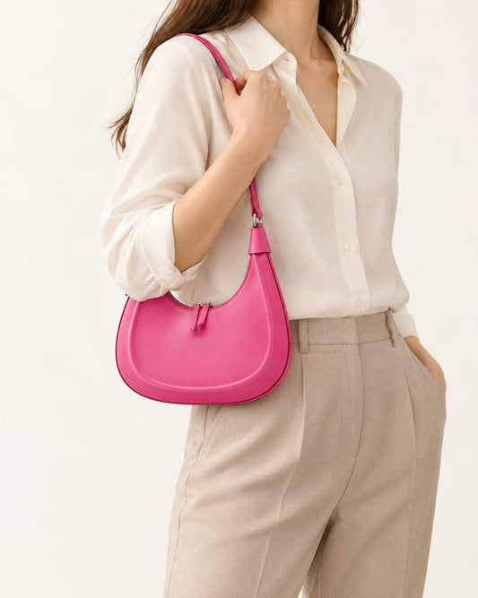 Cowhide Crescent Moon Bag worn crossbody