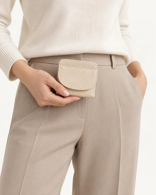 Genuine Leather Bifold Wallet with 8 Card Slots held in hand by a model