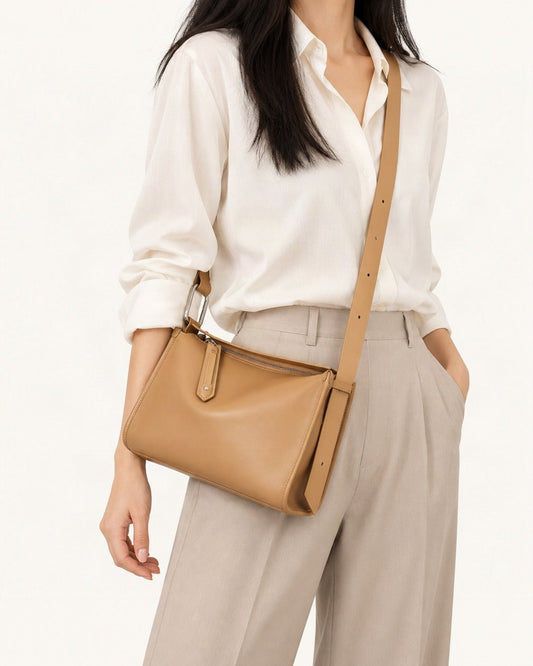 Cowhide Leather Pillow Crossbody Bag worn crossbody