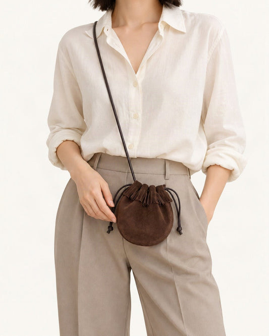 Suede Cowhide Micro Bucket Bag worn crossbody