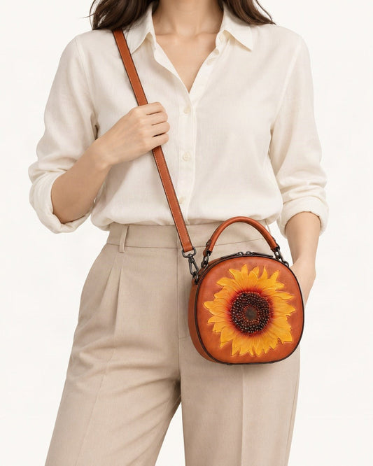 Top-Grain Cowhide Round Crossbody Bag worn crossbody
