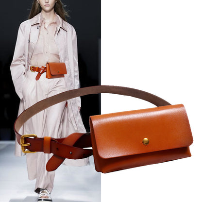 Model wearing a leather belt bag styled over an outfit