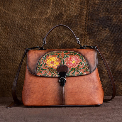 Vintage brown leather flap bag with colorful floral embossing