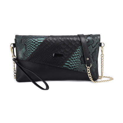 Black clutch with teal green snake-pattern panels