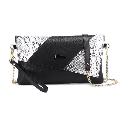 White snake-pattern flap clutch with black trim