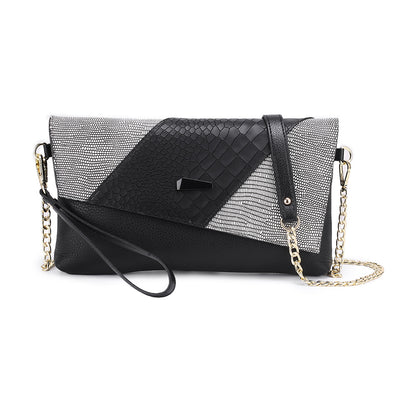 Black flap clutch with reptile-textured panel and chain strap