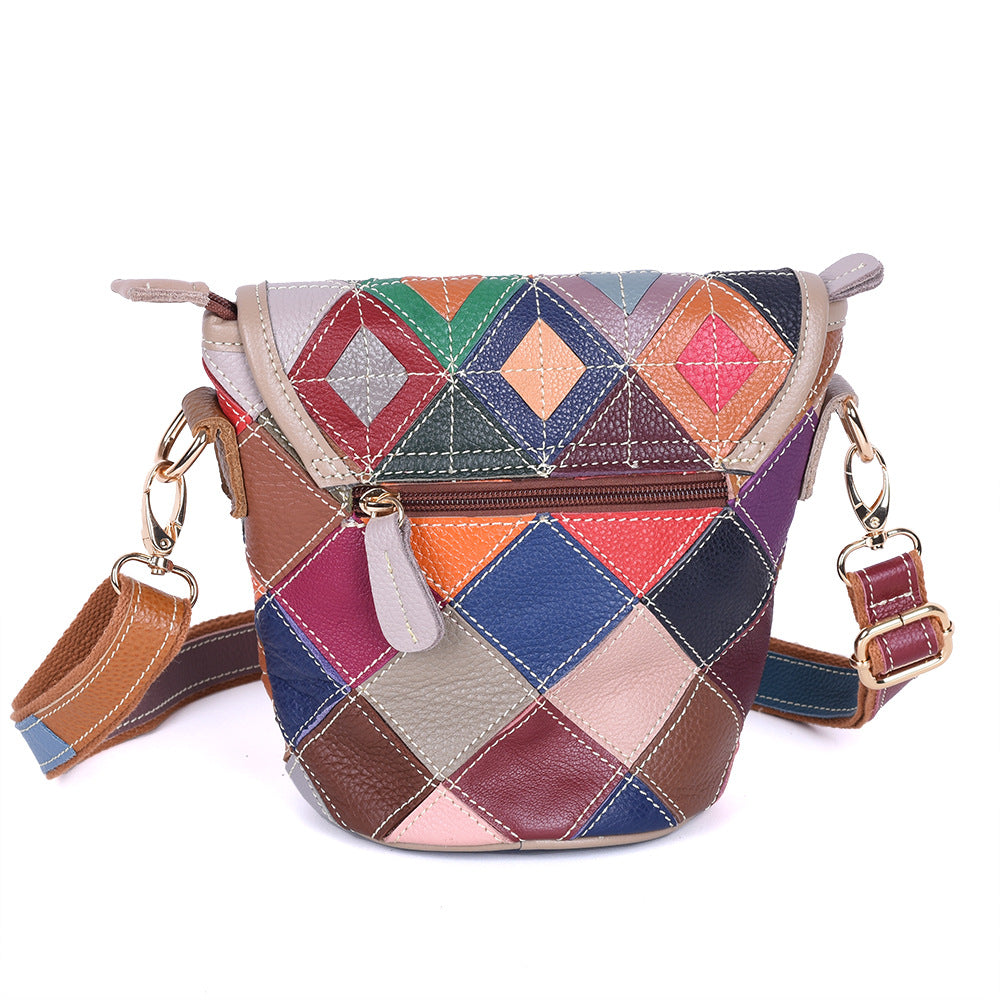 Rear view showing patchwork panels and exterior zip pocket