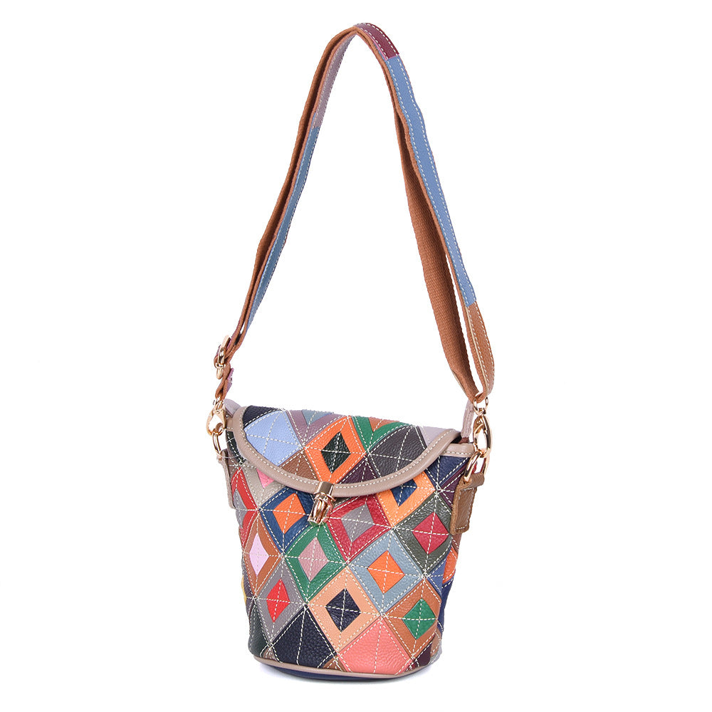 Crossbody bag shown upright with its long single strap