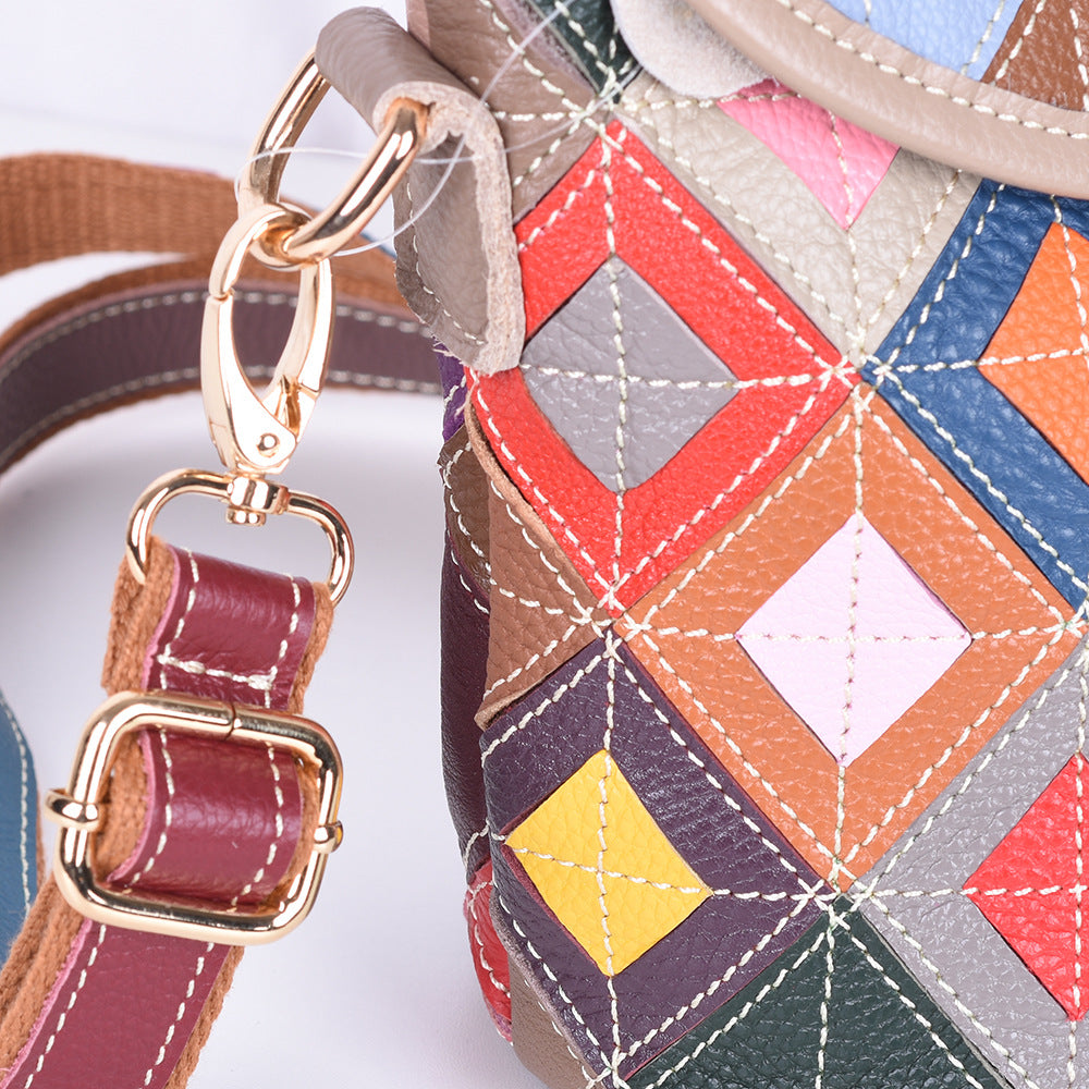 Close-up of strap hardware and contrast stitching on patchwork leather