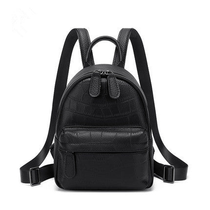 Black crocodile-embossed leather mini backpack front view