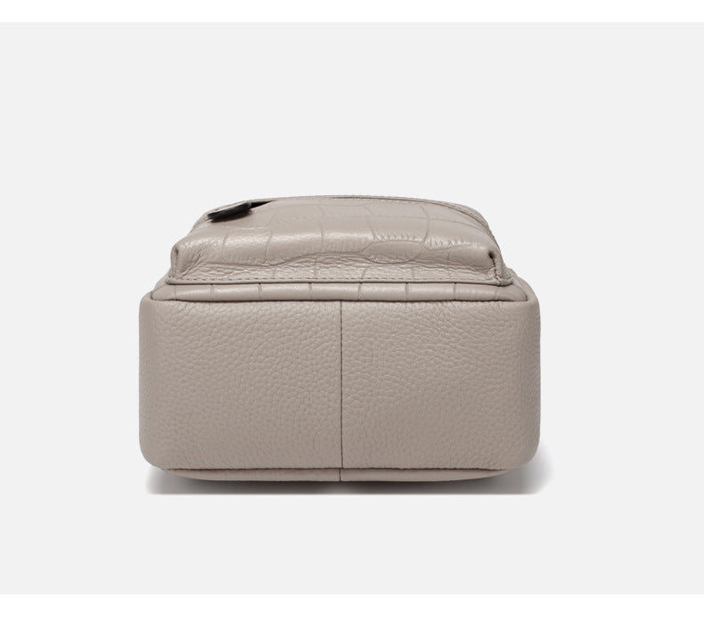 Bottom view of the gray leather mini backpack