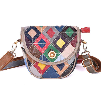 Front view of multicolor cowhide patchwork crossbody bag with flap