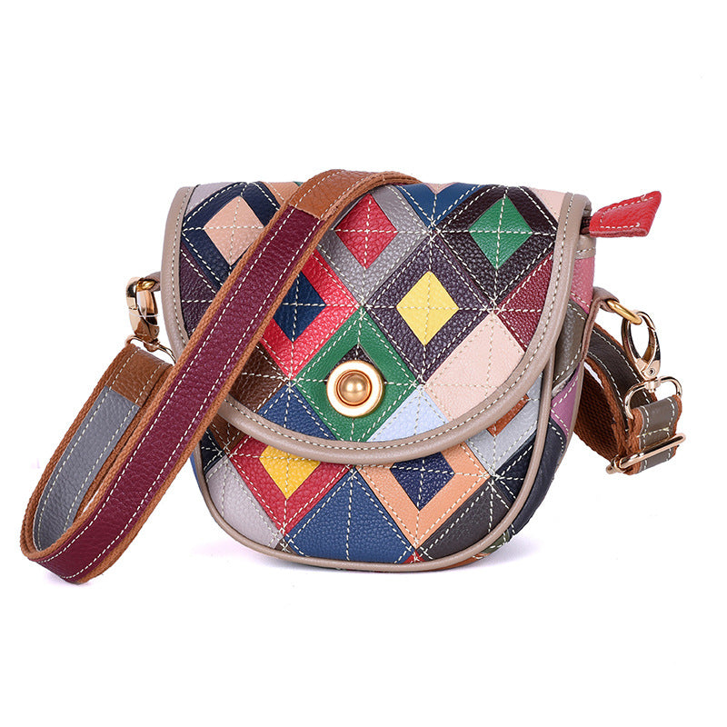 Angled front view showing the bag flap and colorful leather panels