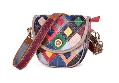 Multicolor flap bag displayed with its strap draped across the front