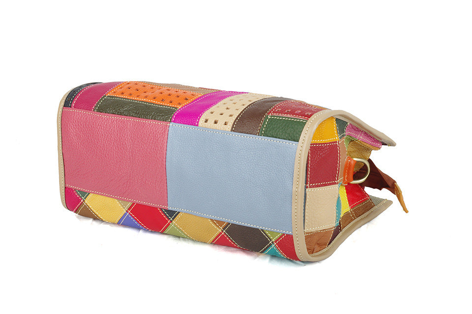 Bottom view of the bag with multicolor leather panels