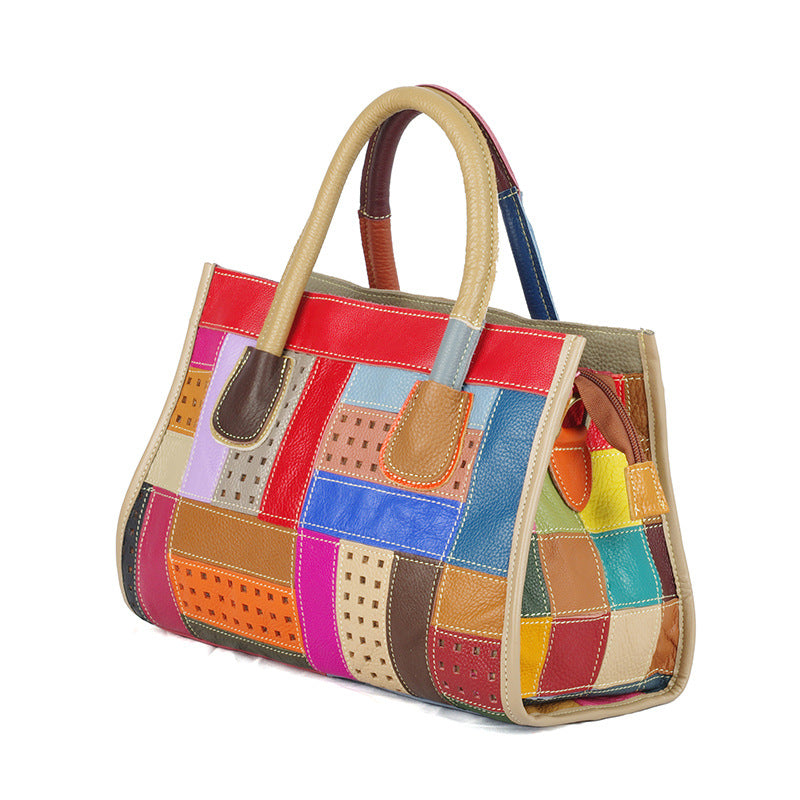 Angled view showing the handbag's side gusset and handles