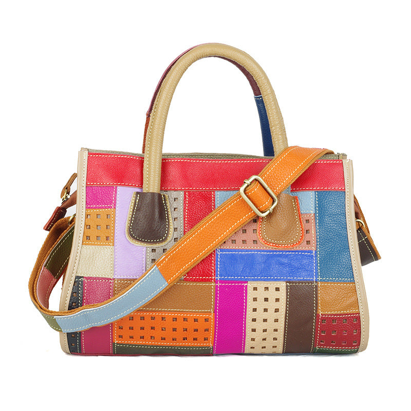 Patchwork cowhide bag with detachable shoulder strap displayed