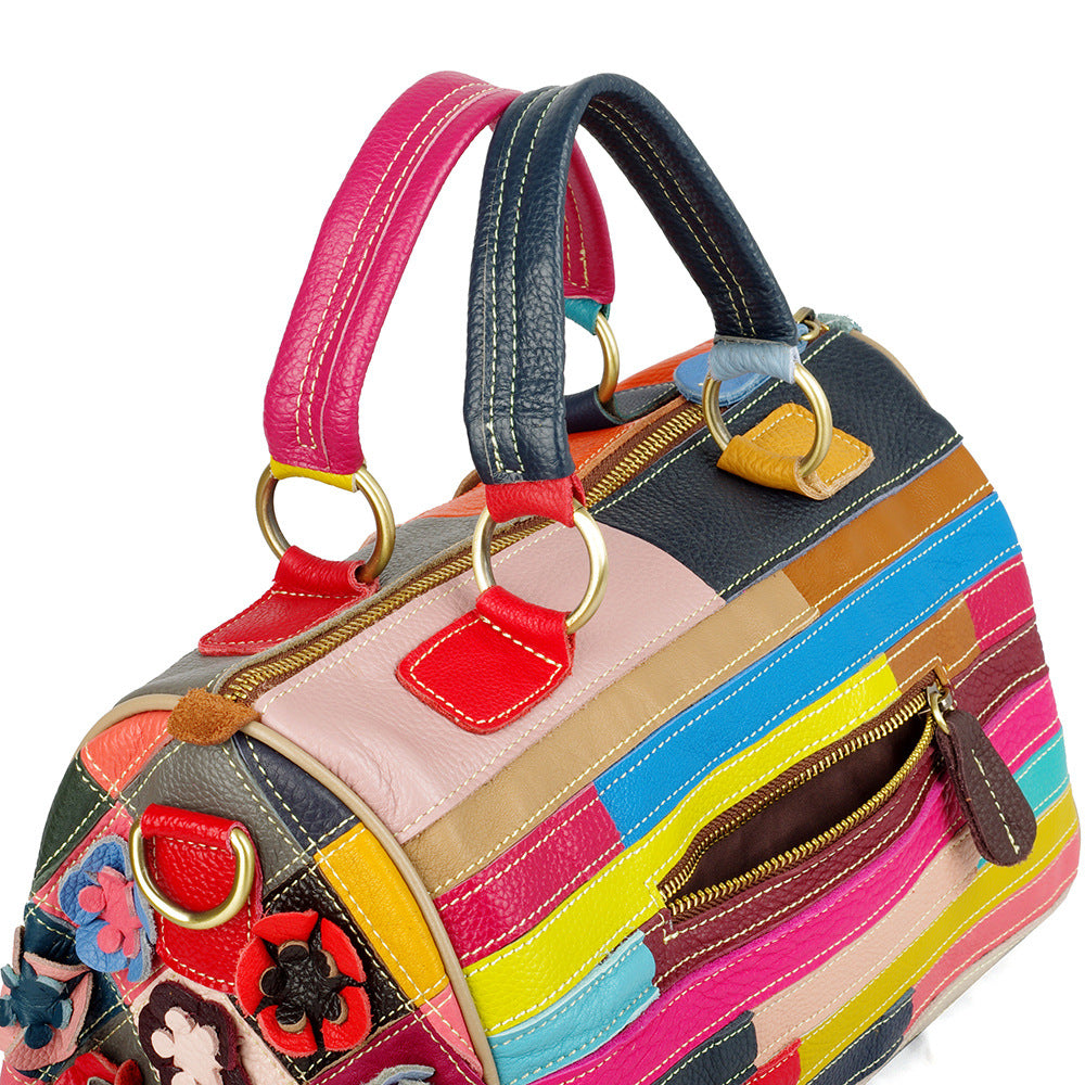 Close-up of contrast leather panels and zipper pocket