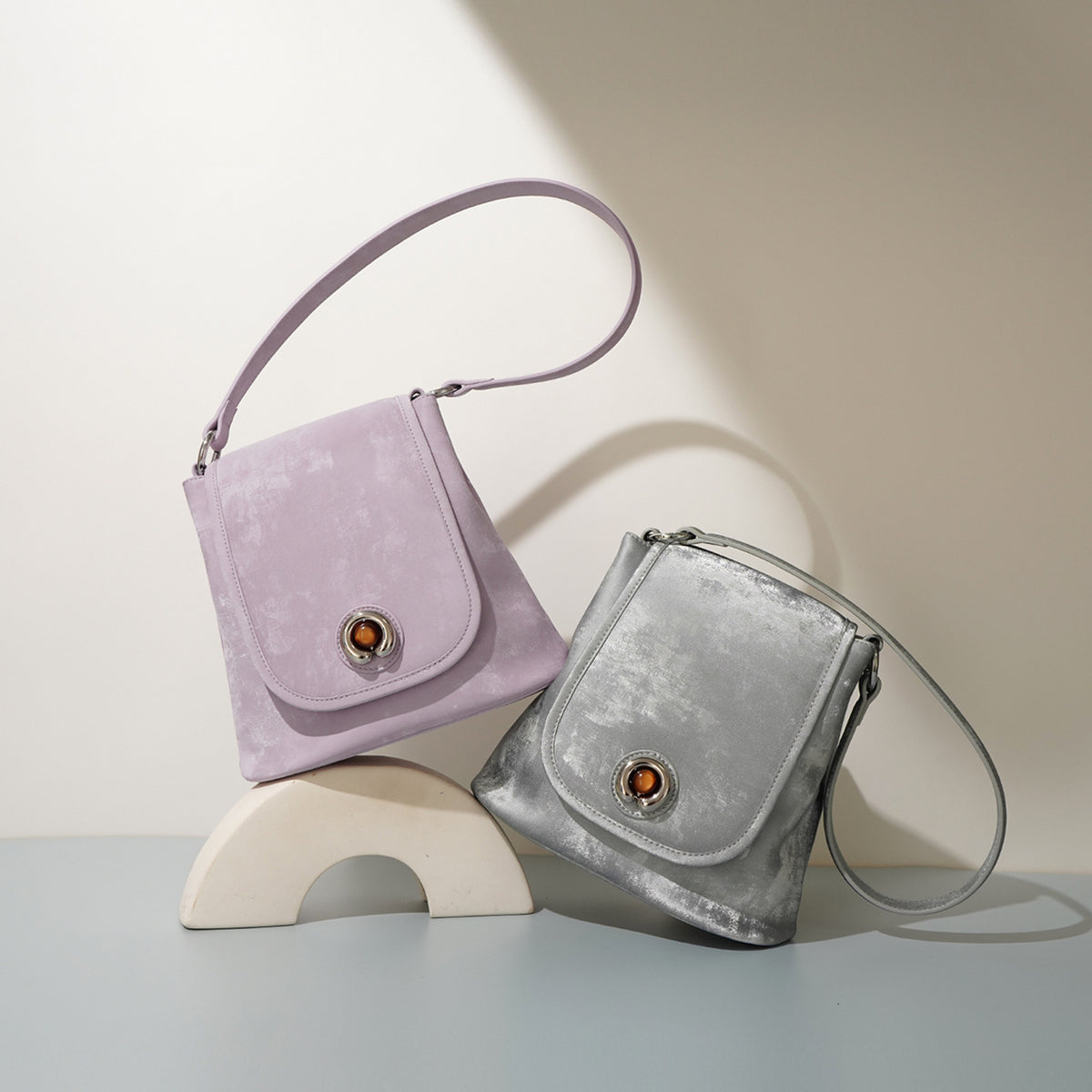 Hyacinth purple and silver gray split leather bucket bags side by side