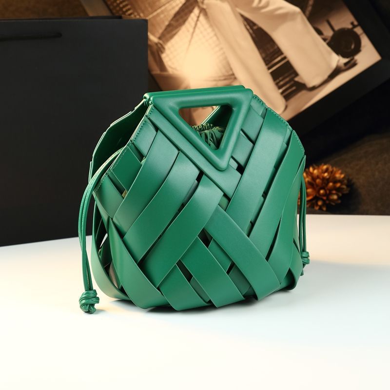Dark green bucket bag with interlaced leather strips