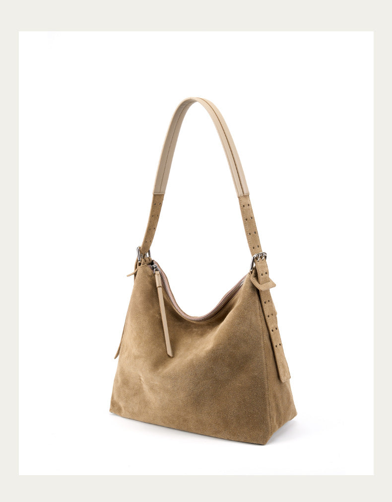 Angled view of the khaki tote and strap details