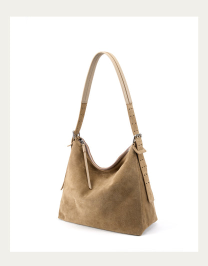 Angled view of the khaki tote and strap details