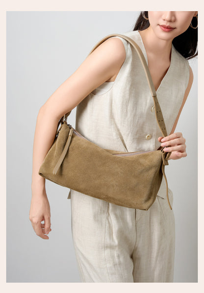 Model wearing the bag crossbody style