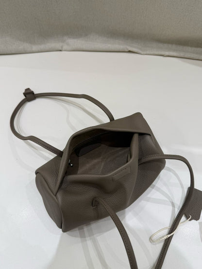 Open elephant gray bag displaying its interior pocket