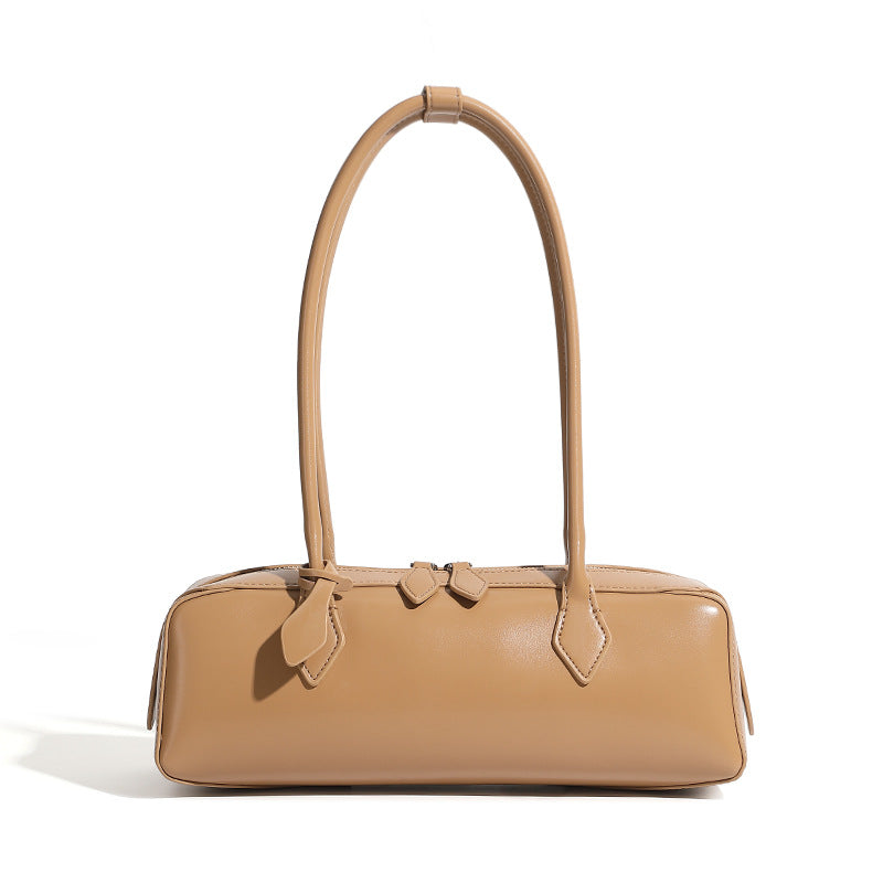 Coffee cowhide leather baguette bag side profile