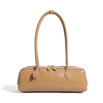 Coffee cowhide leather baguette bag side profile
