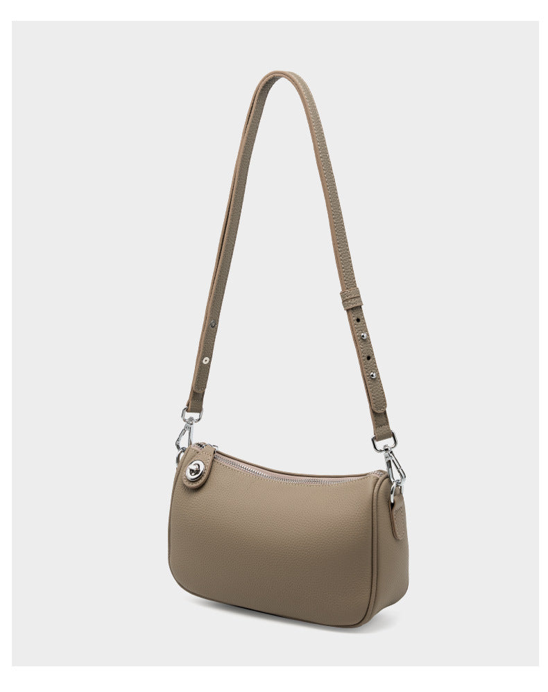 Full taupe bag with long adjustable strap shown on white background