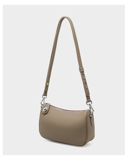 Full taupe bag with long adjustable strap shown on white background