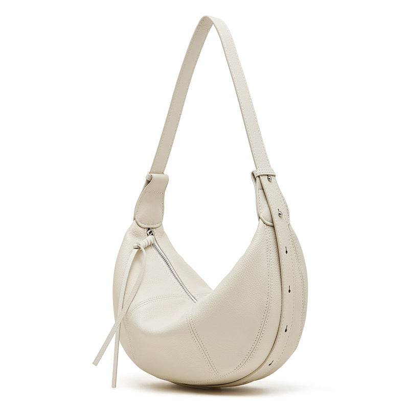 Pearl white pebble leather hobo bag on white background
