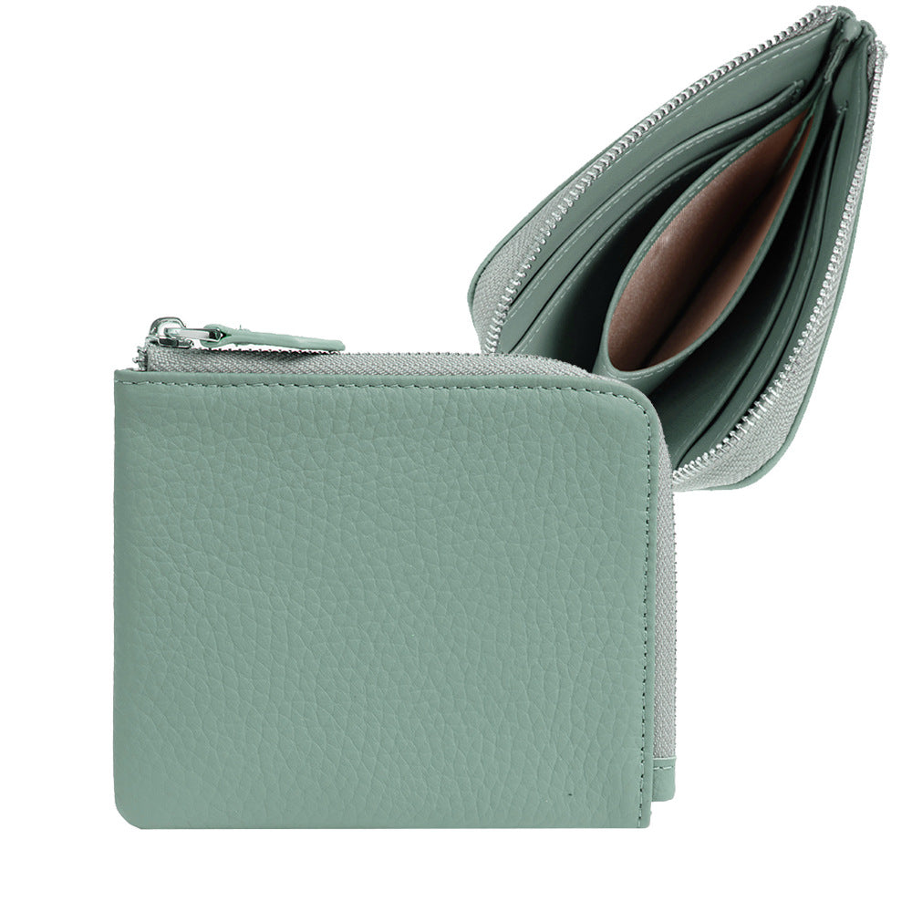Light grey pebbled cowhide leather wallet with zip-around closure and card slots