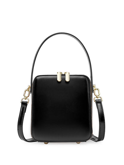 Black cowhide leather mini box bag front view with gold-tone double zip and top handle
