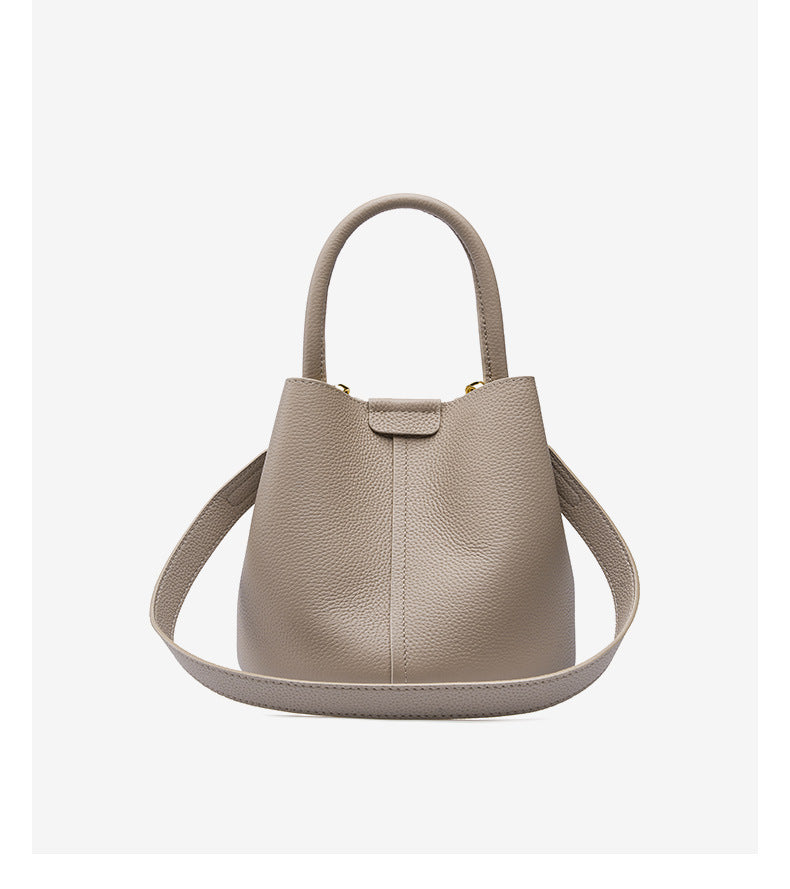 Milk tea bucket bag front view showing top handle and adjustable strap