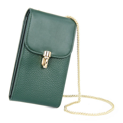 Dark green cowhide vertical phone crossbody bag with gold-tone chain strap and turn-lock flap on white background
