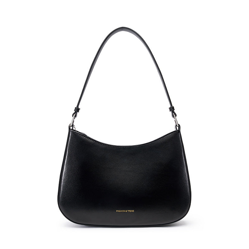 Black cowhide leather underarm shoulder bag with curved top edge and single shoulder strap