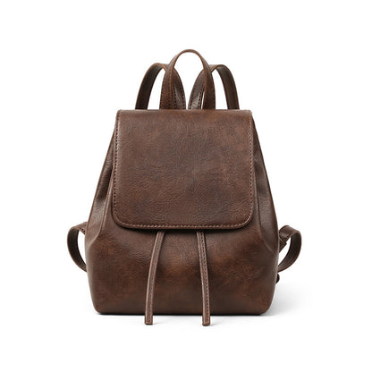 Front-facing product view of the brown backpack