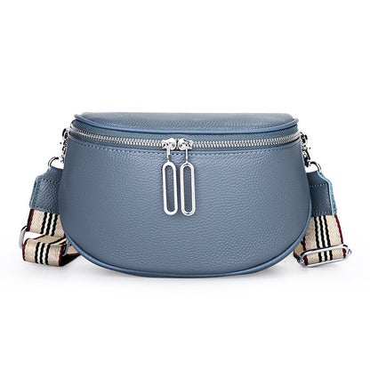 Blue-gray cowhide saddle bag with striped strap