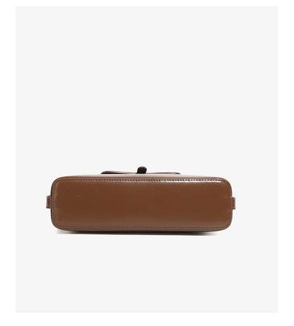 Brown leather bag on white background front view