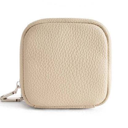 White cowhide leather mini cosmetic pouch with zipper, front view