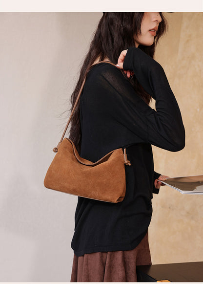 Close lifestyle view of the bag carried over the shoulder
