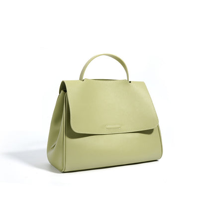 Olive green cowhide leather top-handle bag angled side view
