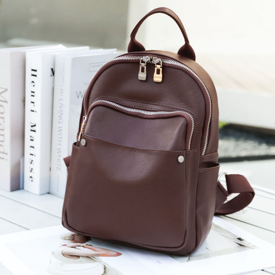 Baroque brown leather backpack angled front view