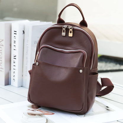 Baroque brown leather backpack angled front view