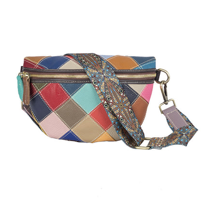 Patchwork cowhide bag showing zip top and wide shoulder strap