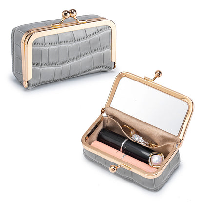 Gray crocodile-embossed pouch shown open and closed